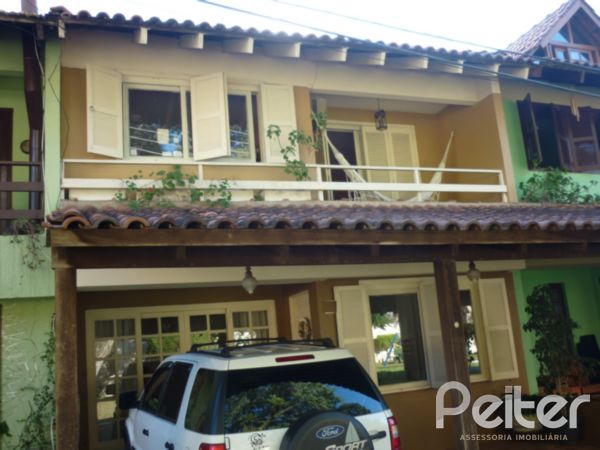 Im&oacute;vel: Peiter Assessoria Imobili&aacute;ria - Casa 3 Dorm (1054)