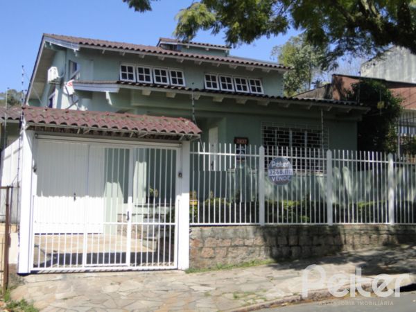Im&oacute;vel: Peiter Assessoria Imobili&aacute;ria - Casa 5 Dorm (1417)