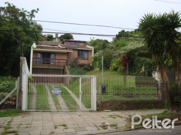 Im&oacute;vel: Peiter Assessoria Imobili&aacute;ria - Casa 3 Dorm (1754)