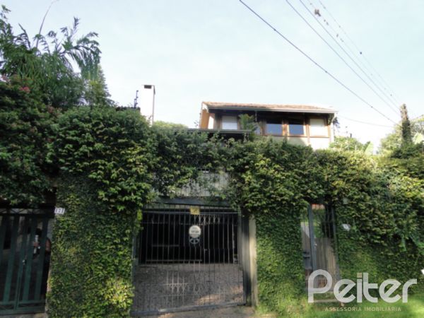 Im&oacute;vel: Peiter Assessoria Imobili&aacute;ria - Casa 3 Dorm (1788)