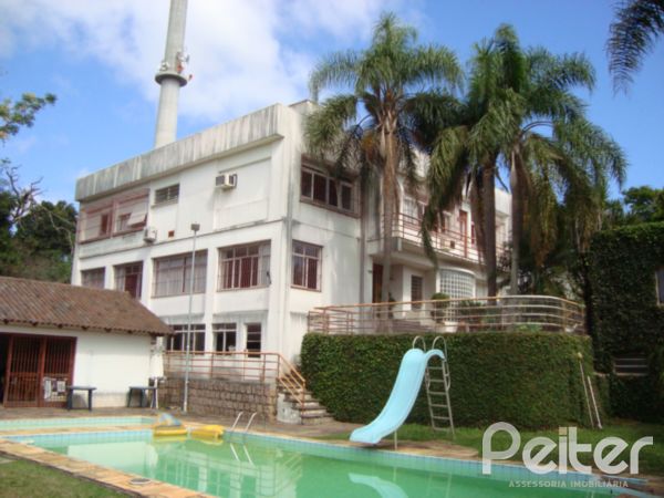 Im&oacute;vel: Peiter Assessoria Imobili&aacute;ria - Casa 5 Dorm (2075)