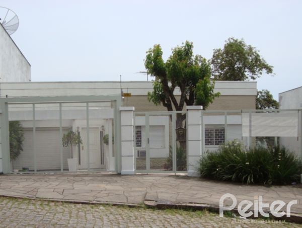 Im&oacute;vel: Peiter Assessoria Imobili&aacute;ria - Casa 4 Dorm (626)