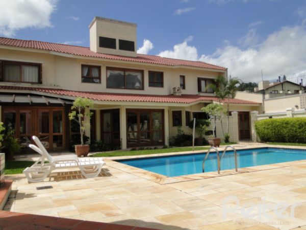 Im&oacute;vel: Peiter Assessoria Imobili&aacute;ria - Casa 6 Dorm (871)