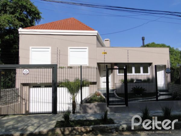 Im&oacute;vel: Peiter Assessoria Imobili&aacute;ria - Casa 3 Dorm (990)