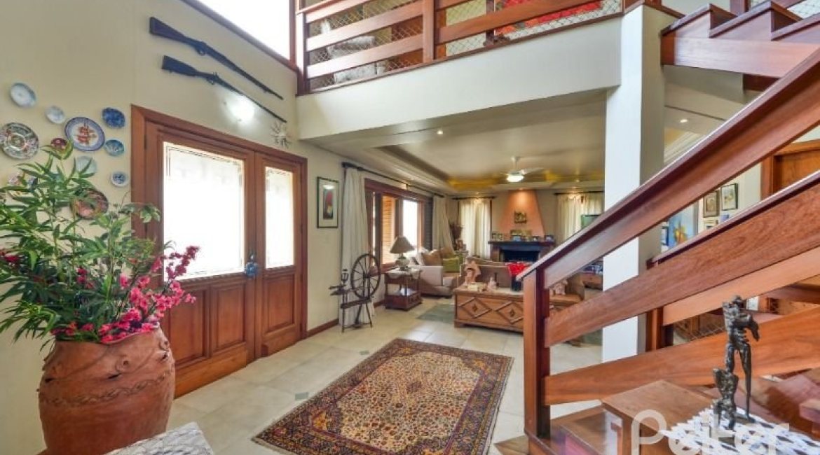 Casa em Condomínio à venda com 389m², 4 dormitórios, 3 suítes, 4 vagas, no bairro Vila Nova em Porto Alegre