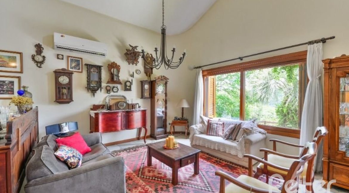 Casa em Condomínio à venda com 389m², 4 dormitórios, 3 suítes, 4 vagas, no bairro Vila Nova em Porto Alegre