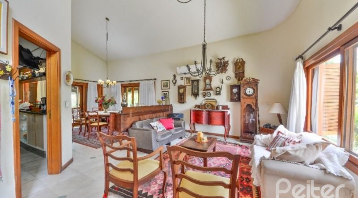 Casa em Condomínio à venda com 389m², 4 dormitórios, 3 suítes, 4 vagas, no bairro Vila Nova em Porto Alegre