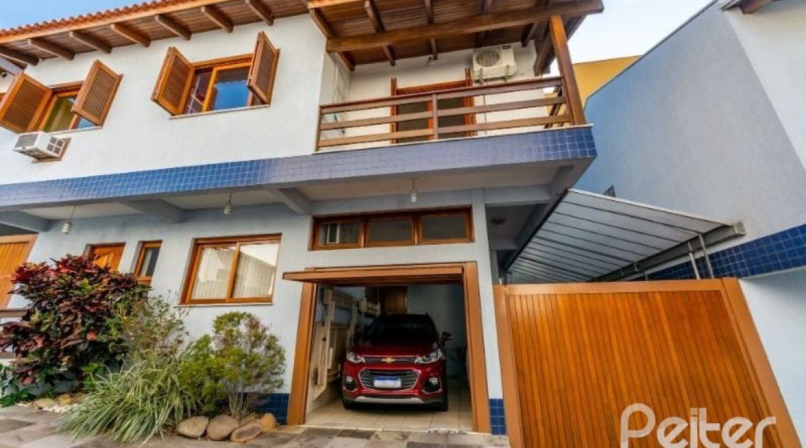 Casa em Condomínio à venda com 145m², 3 dormitórios, 1 suíte, 2 vagas, no bairro Tristeza em Porto Alegre
