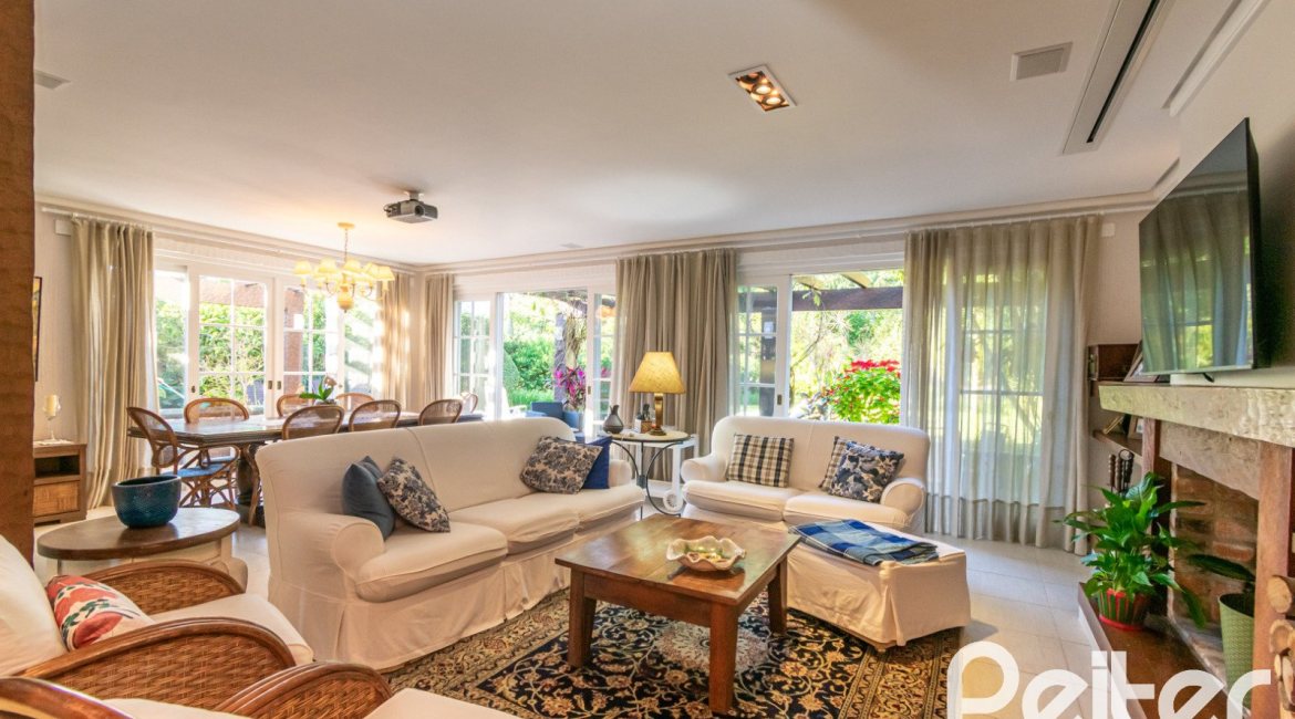 Casa em Condomínio à venda com 321m², 4 dormitórios, 2 suítes, 4 vagas, no bairro Terra Ville em PORTO ALEGRE