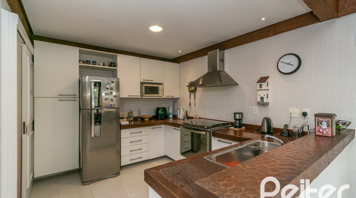 Casa em Condomínio à venda com 321m², 4 dormitórios, 2 suítes, 4 vagas, no bairro Terra Ville em PORTO ALEGRE