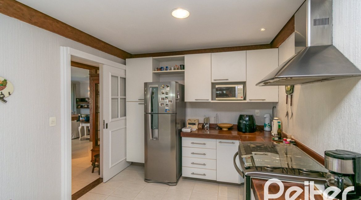 Casa em Condomínio à venda com 321m², 4 dormitórios, 2 suítes, 4 vagas, no bairro Terra Ville em PORTO ALEGRE