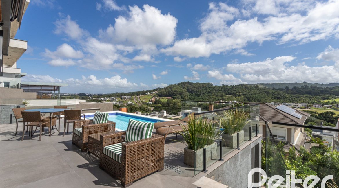 Casa em Condomínio à venda com 303m², 3 dormitórios, 3 suítes, 4 vagas, no bairro Alphaville em PORTO ALEGRE