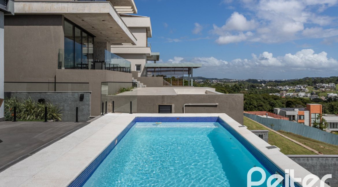 Casa em Condomínio à venda com 303m², 3 dormitórios, 3 suítes, 4 vagas, no bairro Alphaville em PORTO ALEGRE