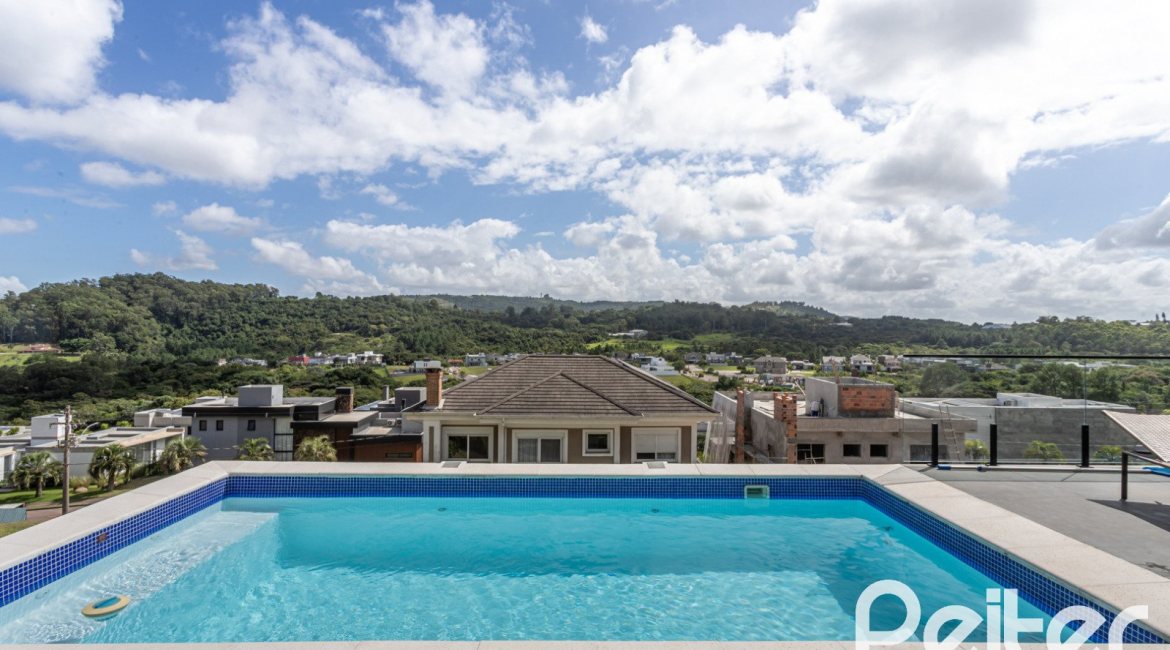 Casa em Condomínio à venda com 303m², 3 dormitórios, 3 suítes, 4 vagas, no bairro Alphaville em PORTO ALEGRE