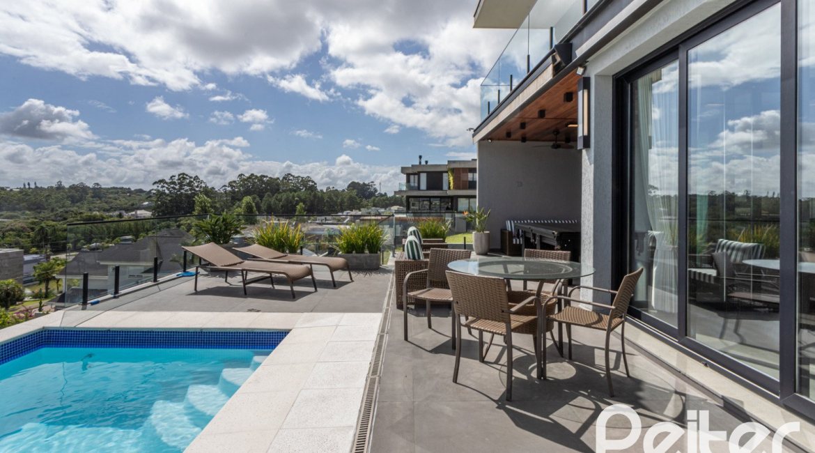 Casa em Condomínio à venda com 303m², 3 dormitórios, 3 suítes, 4 vagas, no bairro Alphaville em PORTO ALEGRE