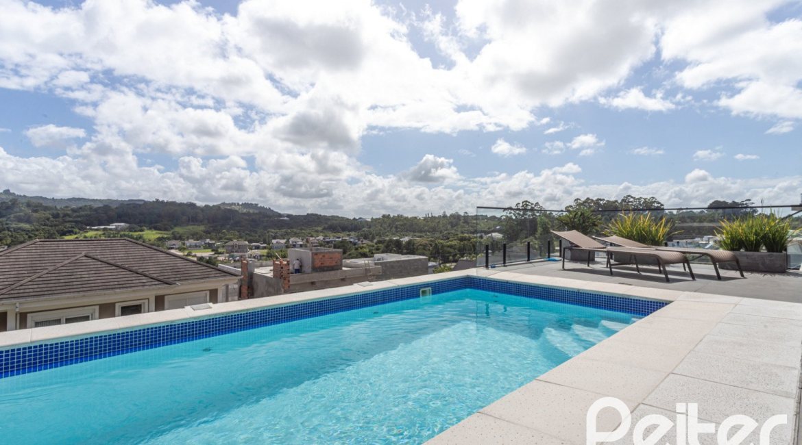 Casa em Condomínio à venda com 303m², 3 dormitórios, 3 suítes, 4 vagas, no bairro Alphaville em PORTO ALEGRE