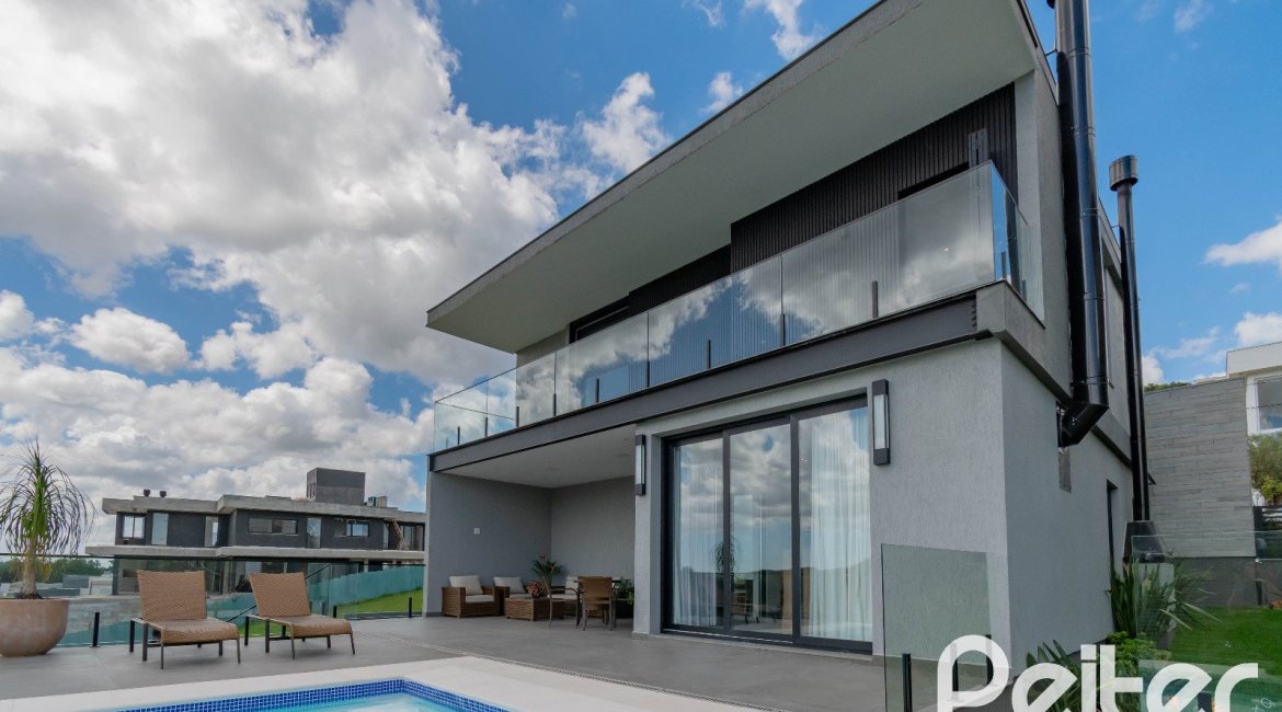 Casa em Condomínio à venda com 303m², 3 dormitórios, 3 suítes, 4 vagas, no bairro Alphaville em PORTO ALEGRE