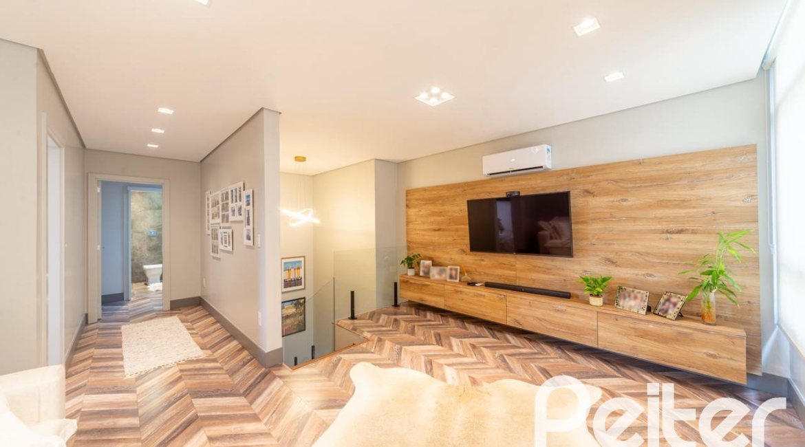 Casa em Condomínio à venda com 303m², 3 dormitórios, 3 suítes, 4 vagas, no bairro Alphaville em PORTO ALEGRE