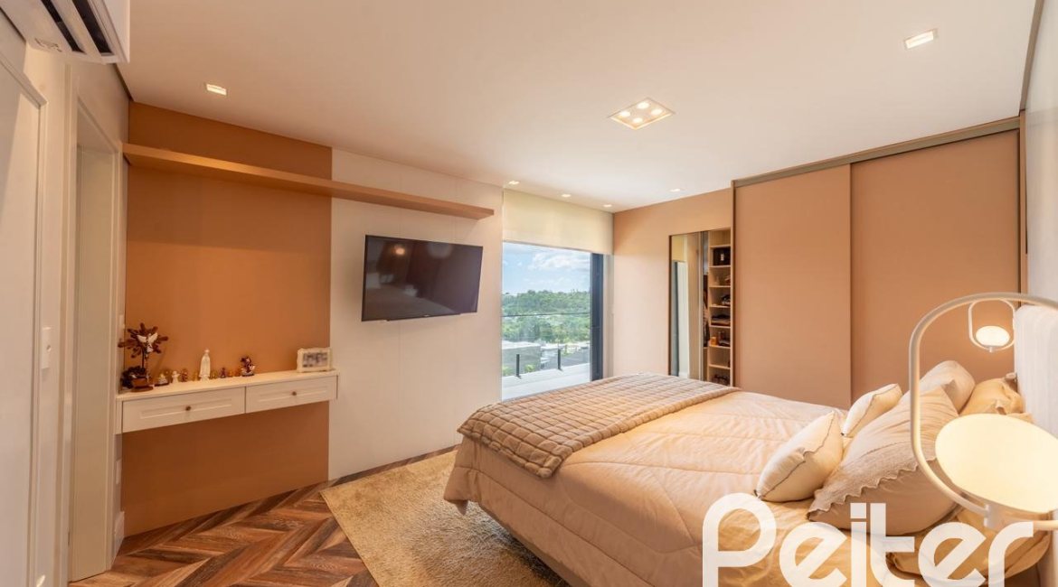 Casa em Condomínio à venda com 303m², 3 dormitórios, 3 suítes, 4 vagas, no bairro Alphaville em PORTO ALEGRE