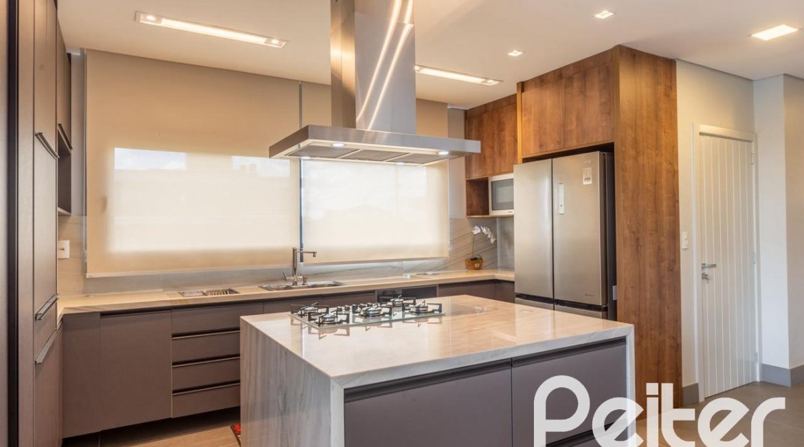 Casa em Condomínio à venda com 303m², 3 dormitórios, 3 suítes, 4 vagas, no bairro Alphaville em PORTO ALEGRE