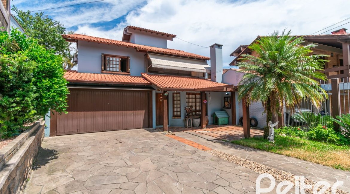 Casa à venda com 279m², 4 dormitórios, 1 suíte, 4 vagas, no bairro Jardim Isabel em Porto Alegre