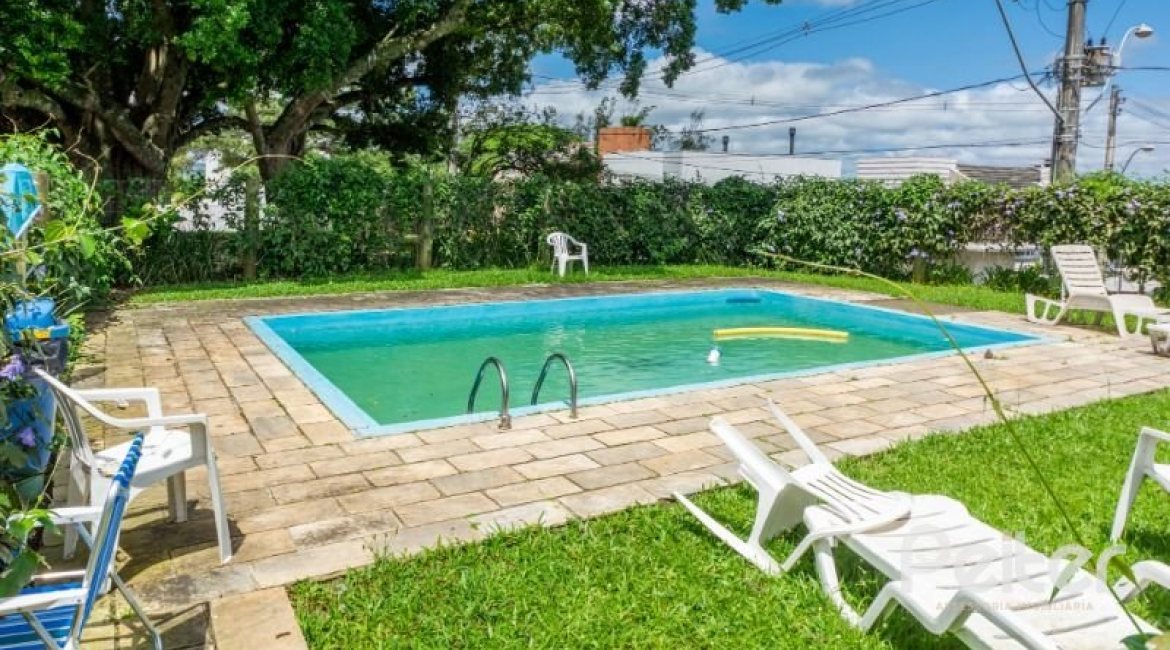 Casa em Condomínio à venda com 250m², 3 dormitórios, 3 suítes, 3 vagas, no bairro Hipica em PORTO ALEGRE