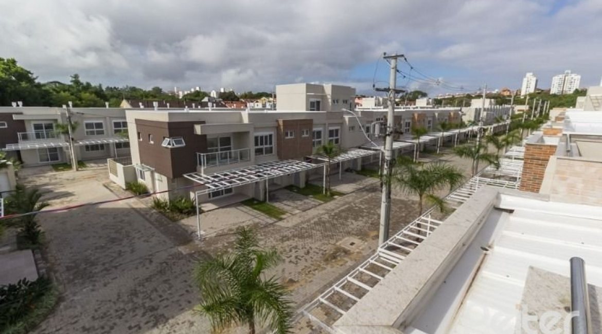 Casa em Condomínio à venda com 162m², 4 dormitórios, 2 suítes, 2 vagas, no bairro Vila Nova em PORTO ALEGRE