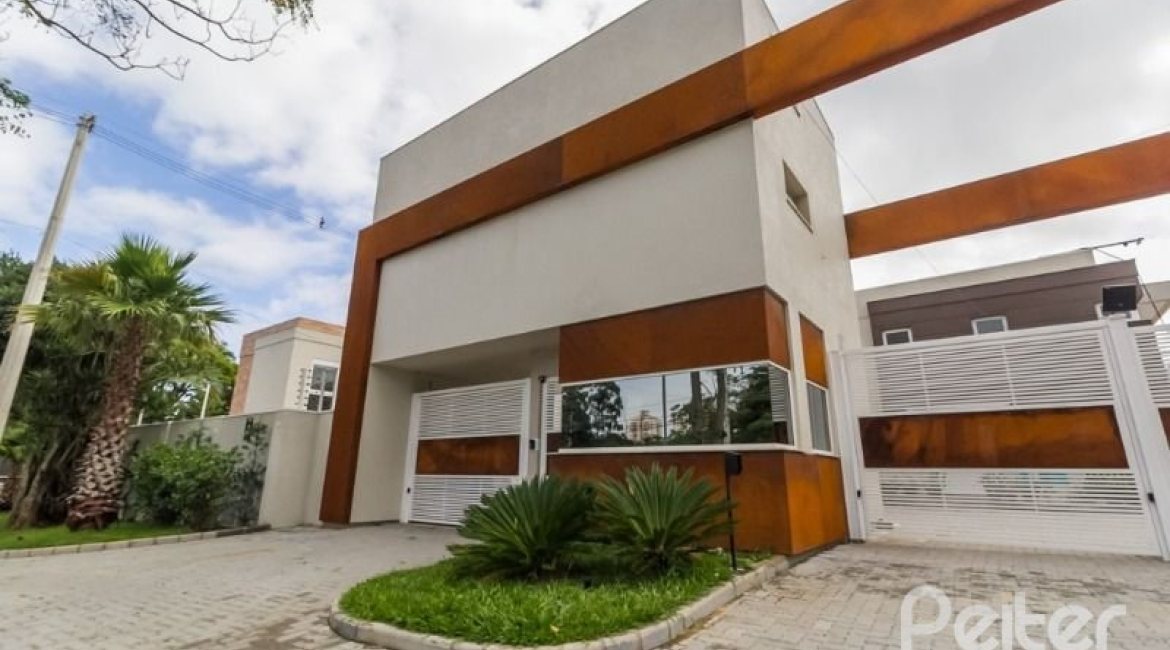 Casa em Condomínio à venda com 162m², 4 dormitórios, 2 suítes, 2 vagas, no bairro Vila Nova em PORTO ALEGRE