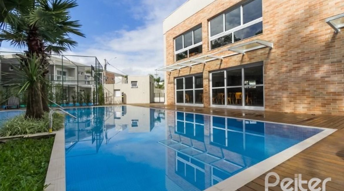 Casa em Condomínio à venda com 162m², 4 dormitórios, 2 suítes, 2 vagas, no bairro Vila Nova em PORTO ALEGRE