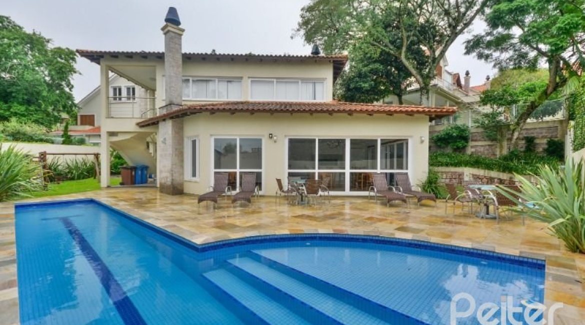 Casa em Condomínio à venda com 397m², 4 dormitórios, 4 suítes, 3 vagas, no bairro Vila Conceicao em PORTO ALEGRE