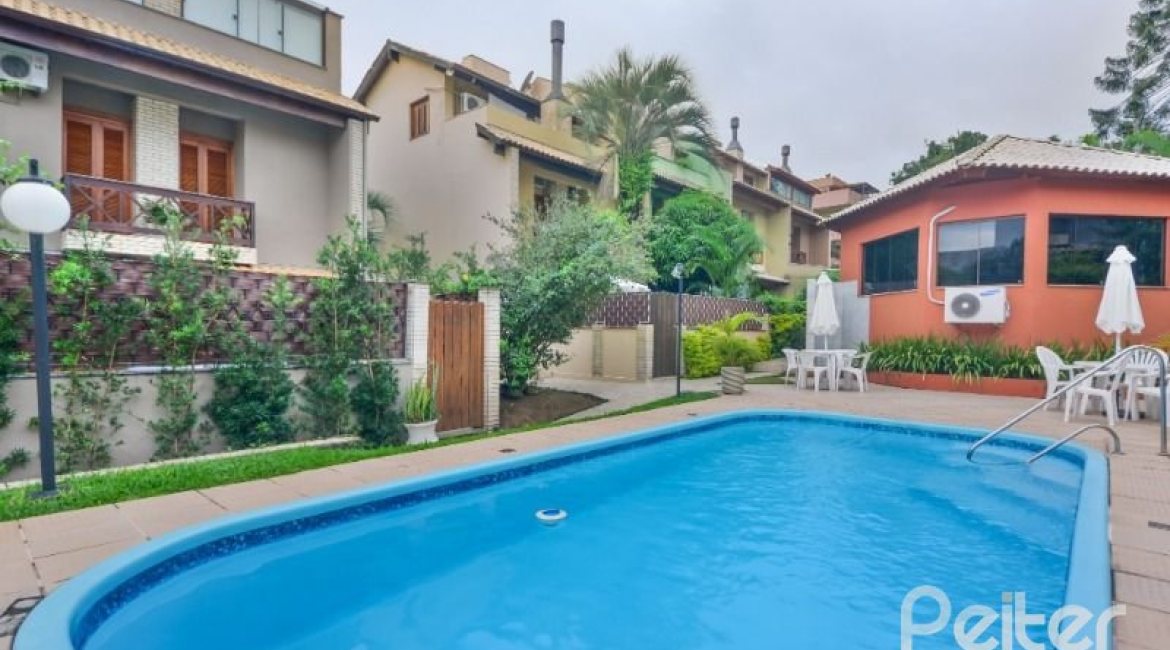 Casa em Condomínio à venda com 181m², 3 dormitórios, 1 suíte, 3 vagas, no bairro Tristeza em PORTO ALEGRE