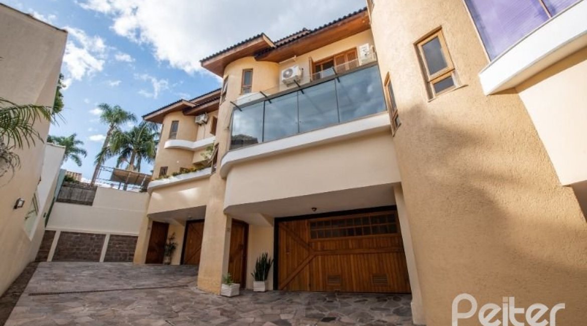 Casa em Condomínio à venda com 240m², 3 dormitórios, 1 suíte, 2 vagas, no bairro Jardim Isabel em Porto Alegre