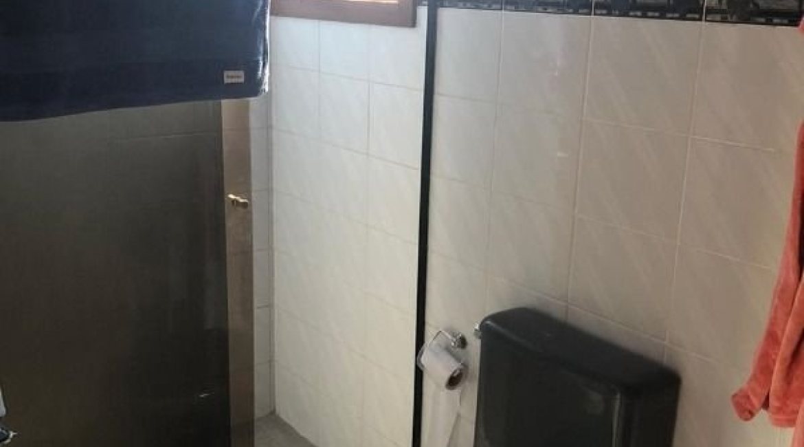 Casa à venda com 159m², 3 dormitórios, 1 suíte, 3 vagas, no bairro Ipanema / Altos Do Ipê em Porto Alegre
