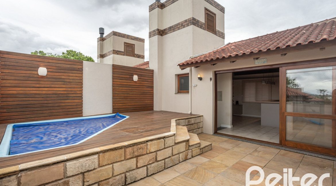 Casa em Condomínio à venda com 290m², 3 dormitórios, 1 suíte, 2 vagas, no bairro Jardim Isabel em Porto Alegre