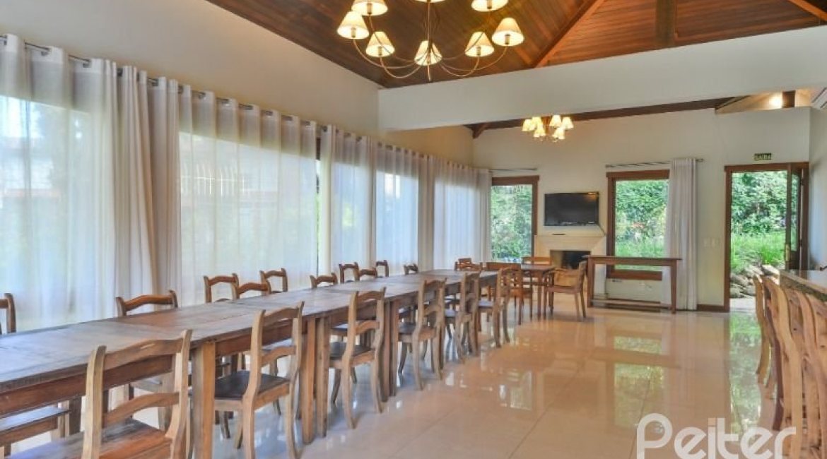 Casa em Condomínio à venda com 500m², 4 dormitórios, 4 suítes, 3 vagas, no bairro Vila Assunção em Porto Alegre