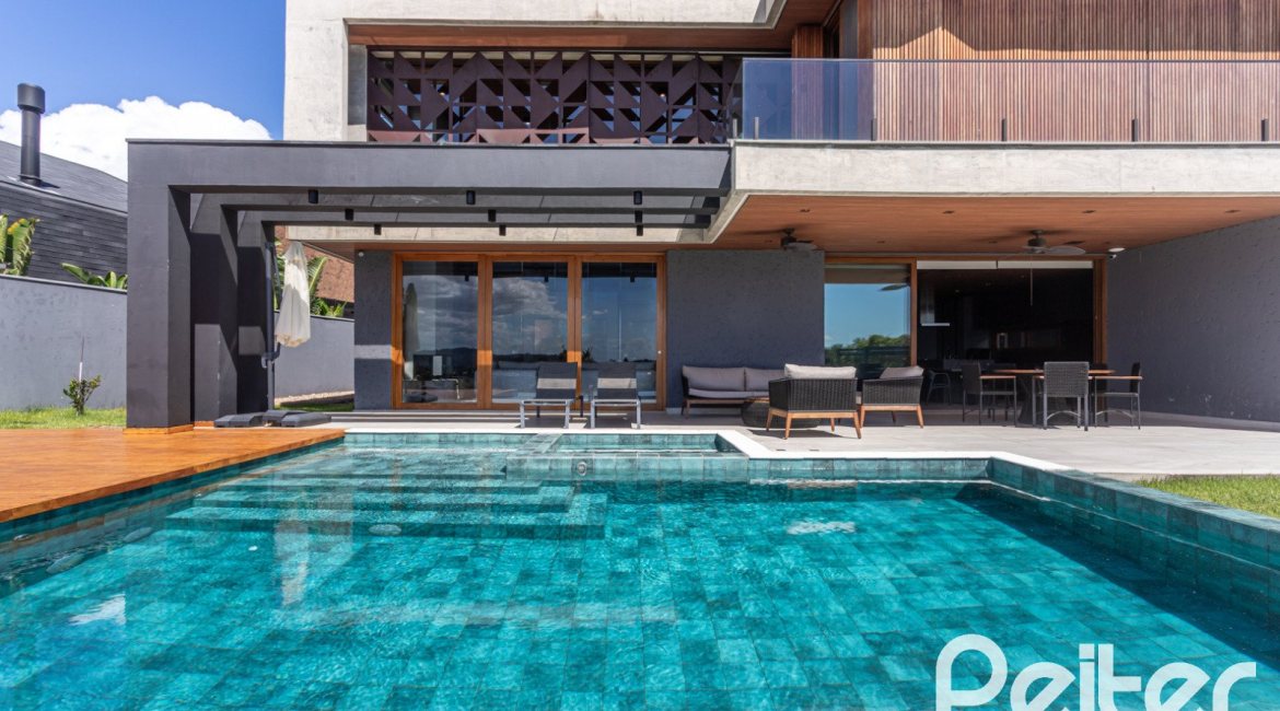 Casa em Condomínio à venda com 608m², 5 dormitórios, 5 suítes, 3 vagas, no bairro Terra Ville em PORTO ALEGRE