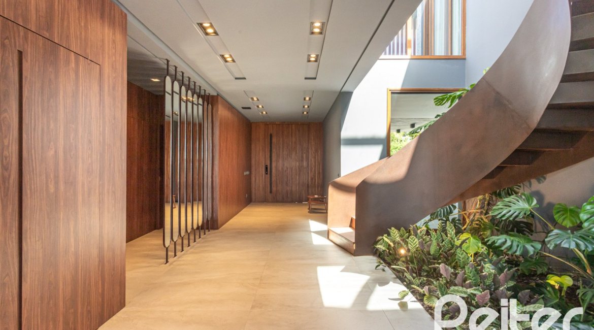 Casa em Condomínio à venda com 608m², 5 dormitórios, 5 suítes, 3 vagas, no bairro Terra Ville em PORTO ALEGRE