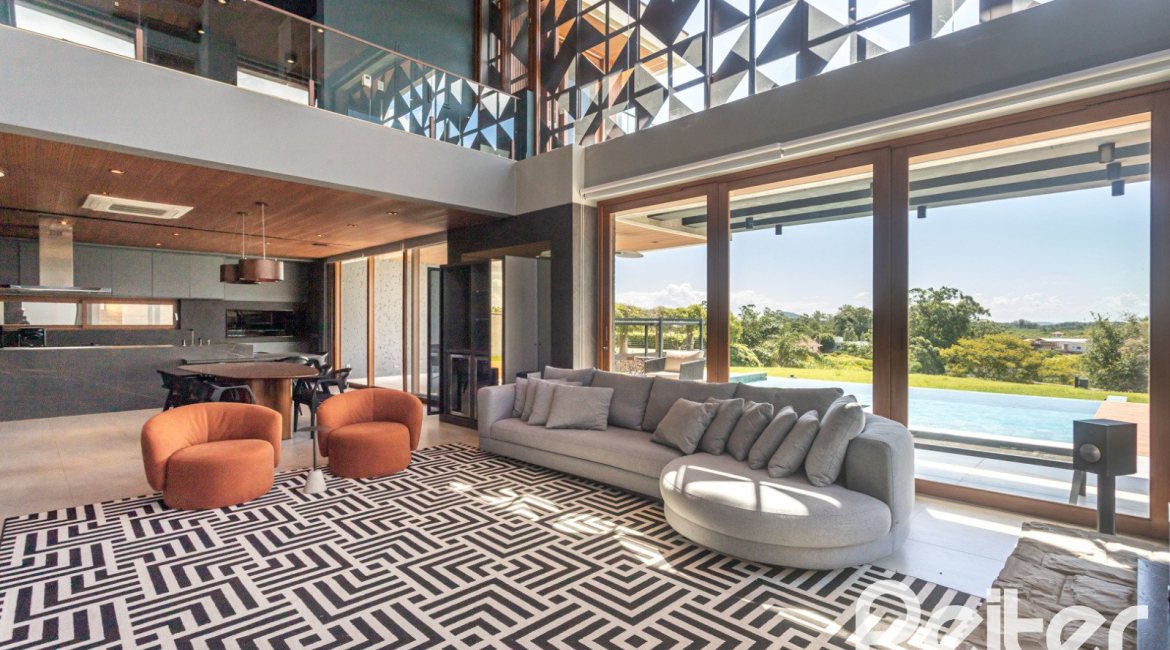 Casa em Condomínio à venda com 608m², 5 dormitórios, 5 suítes, 3 vagas, no bairro Terra Ville em PORTO ALEGRE
