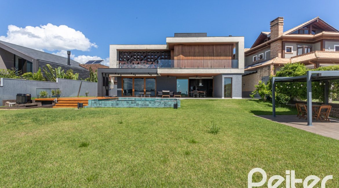 Casa em Condomínio à venda com 608m², 5 dormitórios, 5 suítes, 3 vagas, no bairro Terra Ville em PORTO ALEGRE