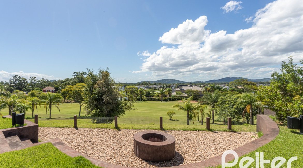 Casa em Condomínio à venda com 608m², 5 dormitórios, 5 suítes, 3 vagas, no bairro Terra Ville em PORTO ALEGRE