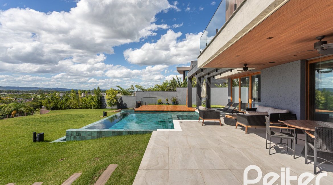 Casa em Condomínio à venda com 608m², 5 dormitórios, 5 suítes, 3 vagas, no bairro Terra Ville em PORTO ALEGRE