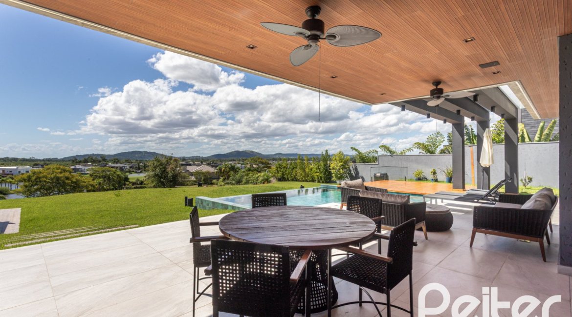 Casa em Condomínio à venda com 608m², 5 dormitórios, 5 suítes, 3 vagas, no bairro Terra Ville em PORTO ALEGRE