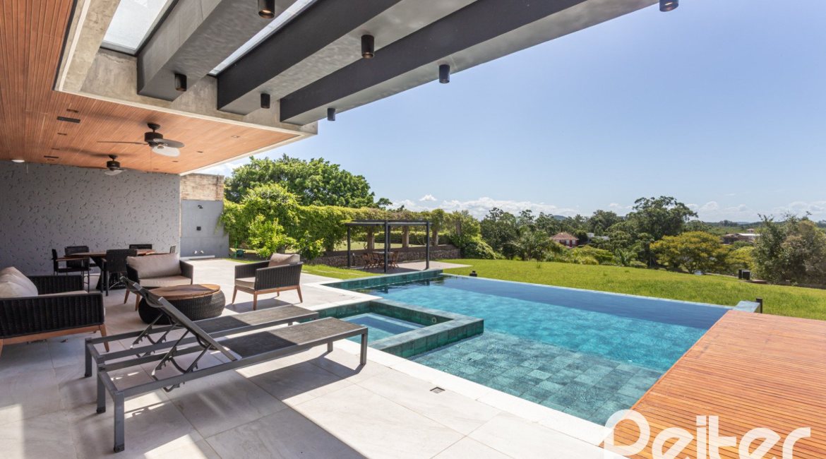 Casa em Condomínio à venda com 608m², 5 dormitórios, 5 suítes, 3 vagas, no bairro Terra Ville em PORTO ALEGRE
