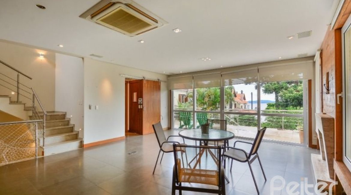 Casa em Condomínio à venda com 397m², 4 dormitórios, 4 suítes, 3 vagas, no bairro Vila Conceicao em PORTO ALEGRE