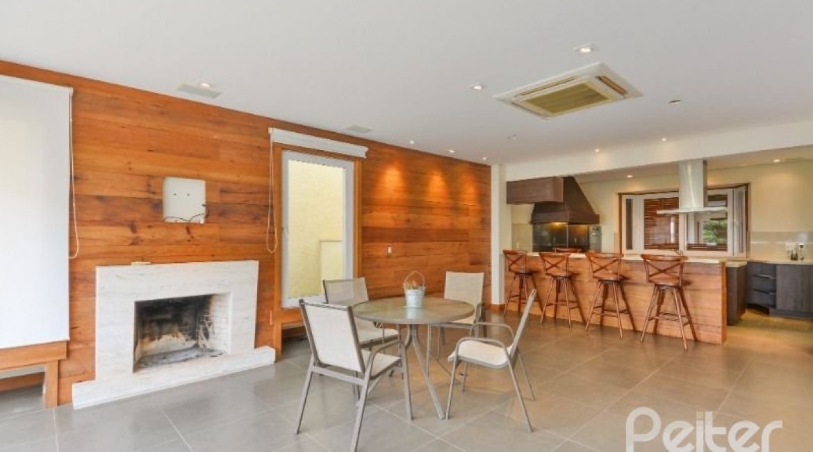 Casa em Condomínio à venda com 397m², 4 dormitórios, 4 suítes, 3 vagas, no bairro Vila Conceicao em PORTO ALEGRE