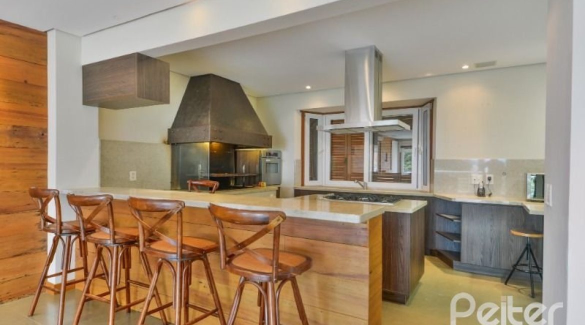 Casa em Condomínio à venda com 397m², 4 dormitórios, 4 suítes, 3 vagas, no bairro Vila Conceicao em PORTO ALEGRE