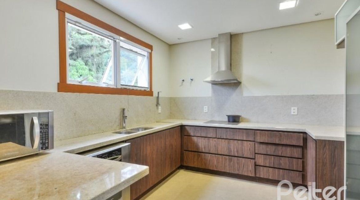 Casa em Condomínio à venda com 397m², 4 dormitórios, 4 suítes, 3 vagas, no bairro Vila Conceicao em PORTO ALEGRE