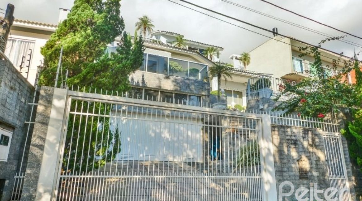 Casa à venda com 399m², 3 dormitórios, 3 suítes, 4 vagas, no bairro Nonoai em Porto Alegre