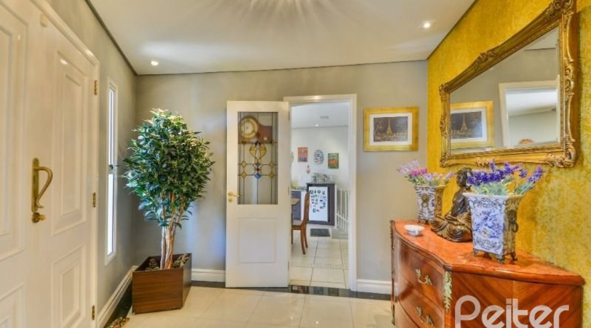 Casa à venda com 399m², 3 dormitórios, 3 suítes, 4 vagas, no bairro Nonoai em Porto Alegre