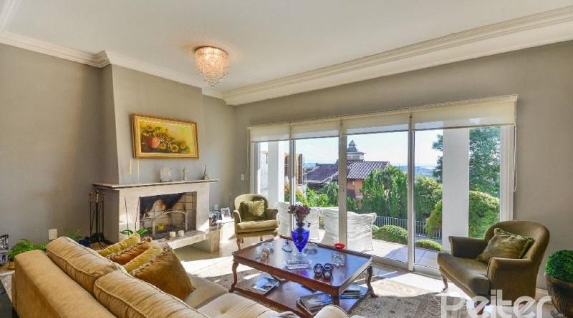 Casa à venda com 399m², 3 dormitórios, 3 suítes, 4 vagas, no bairro Nonoai em Porto Alegre